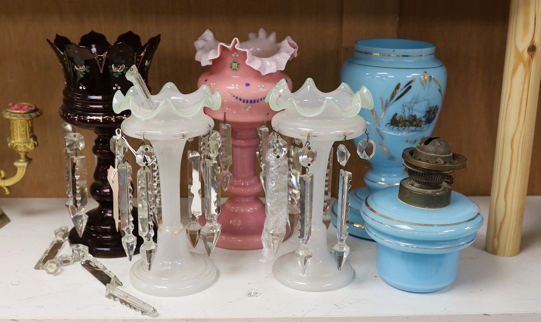 A pair of Victorian lustres two others and an oil lamp, tallest 26cms high